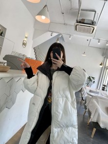 Длинный женский спортивный пуховик с полосками фото